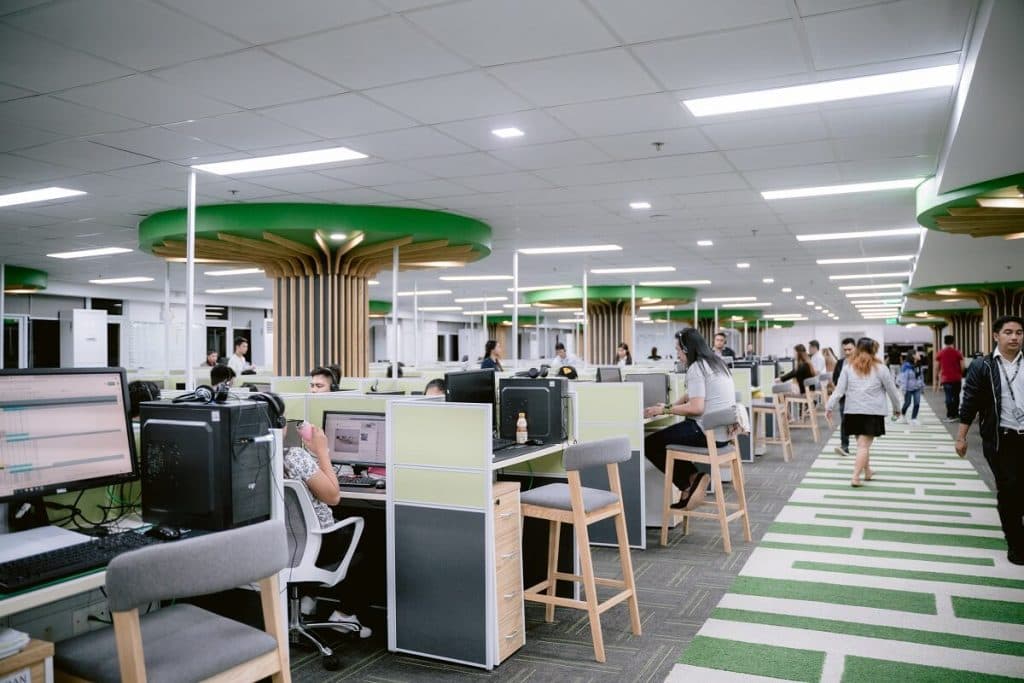 611 Global operations floor with staff at modern workstations