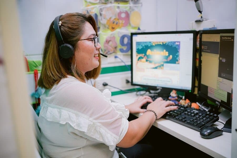 A 611 Global team member at a technical workstation